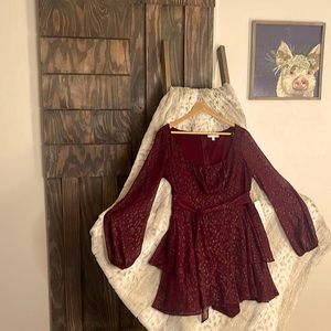 Burgundy sheer skort. Hint of metallic gold threads. Perfect for a first date.🫦